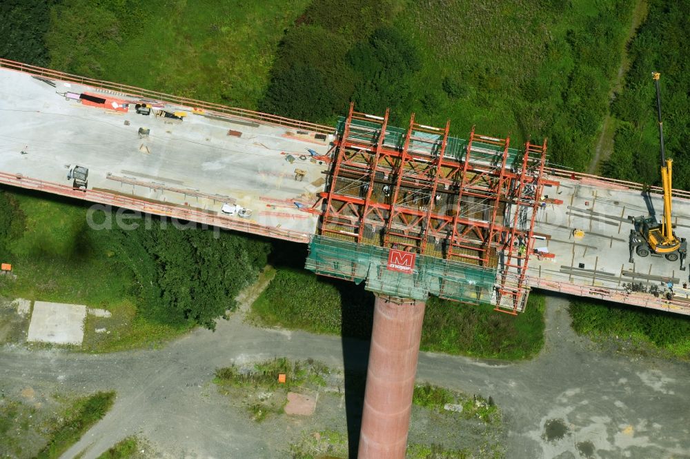 Aerial image Olsberg - Construction site for the new building of Routing and traffic lanes over the highway bridge in the motorway A 46n in the district Bigge in Olsberg in the state North Rhine-Westphalia, Germany