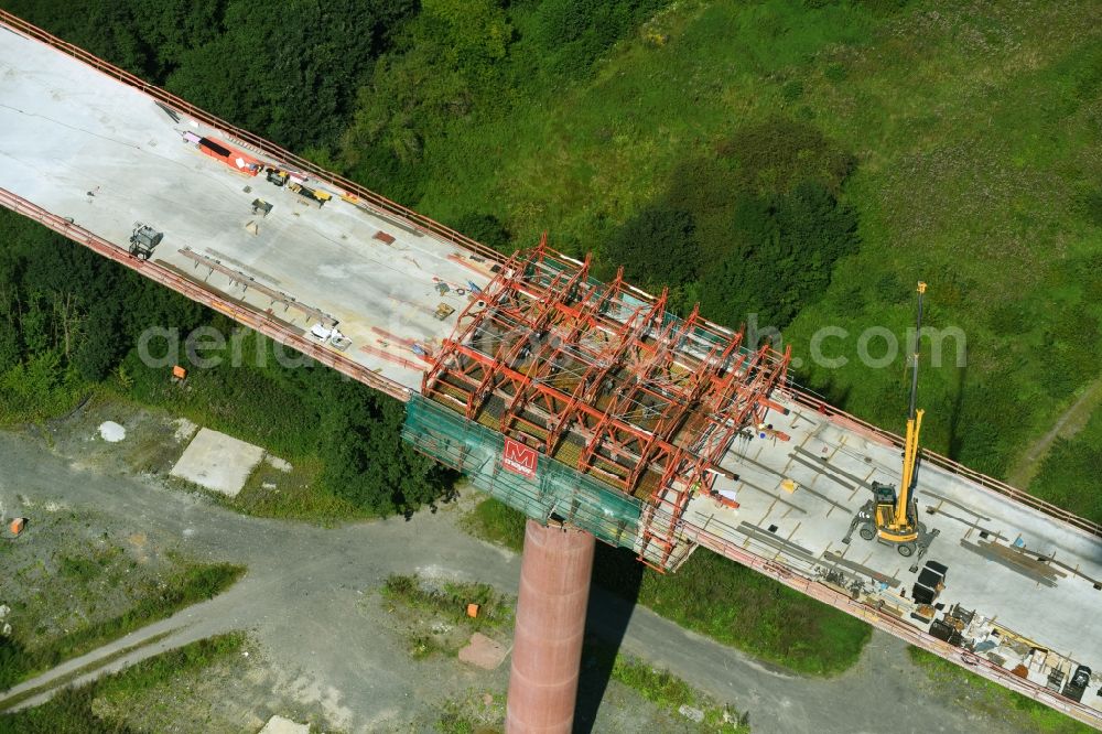 Aerial photograph Olsberg - Construction site for the new building of Routing and traffic lanes over the highway bridge in the motorway A 46n in the district Bigge in Olsberg in the state North Rhine-Westphalia, Germany