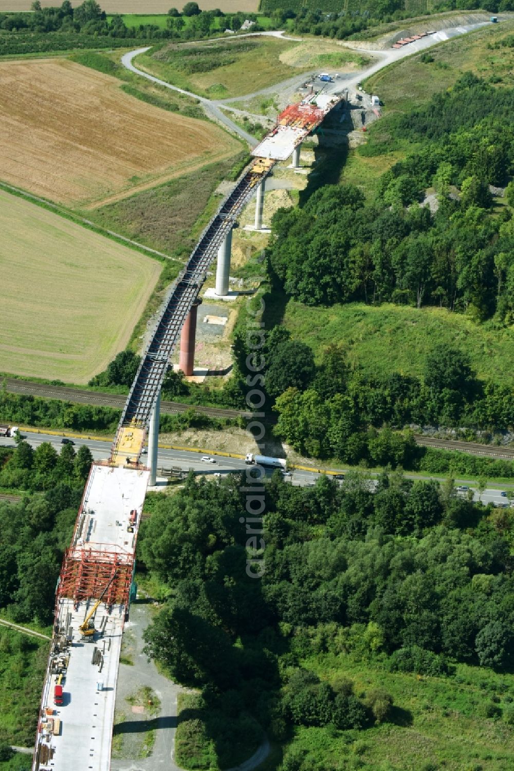 Aerial image Olsberg - Construction site for the new building of Routing and traffic lanes over the highway bridge in the motorway A 46n in the district Bigge in Olsberg in the state North Rhine-Westphalia, Germany