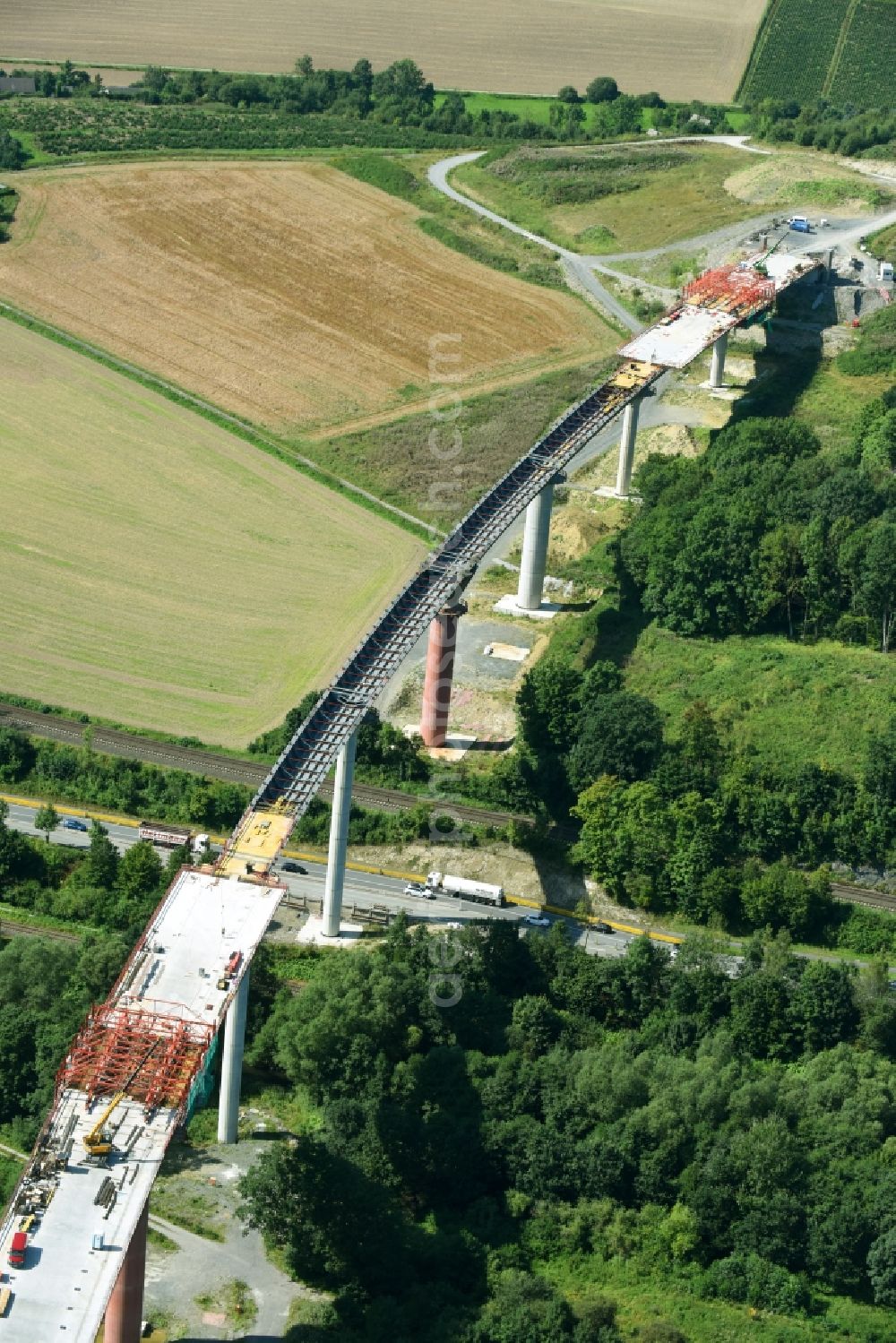 Aerial photograph Olsberg - Construction site for the new building of Routing and traffic lanes over the highway bridge in the motorway A 46n in the district Bigge in Olsberg in the state North Rhine-Westphalia, Germany