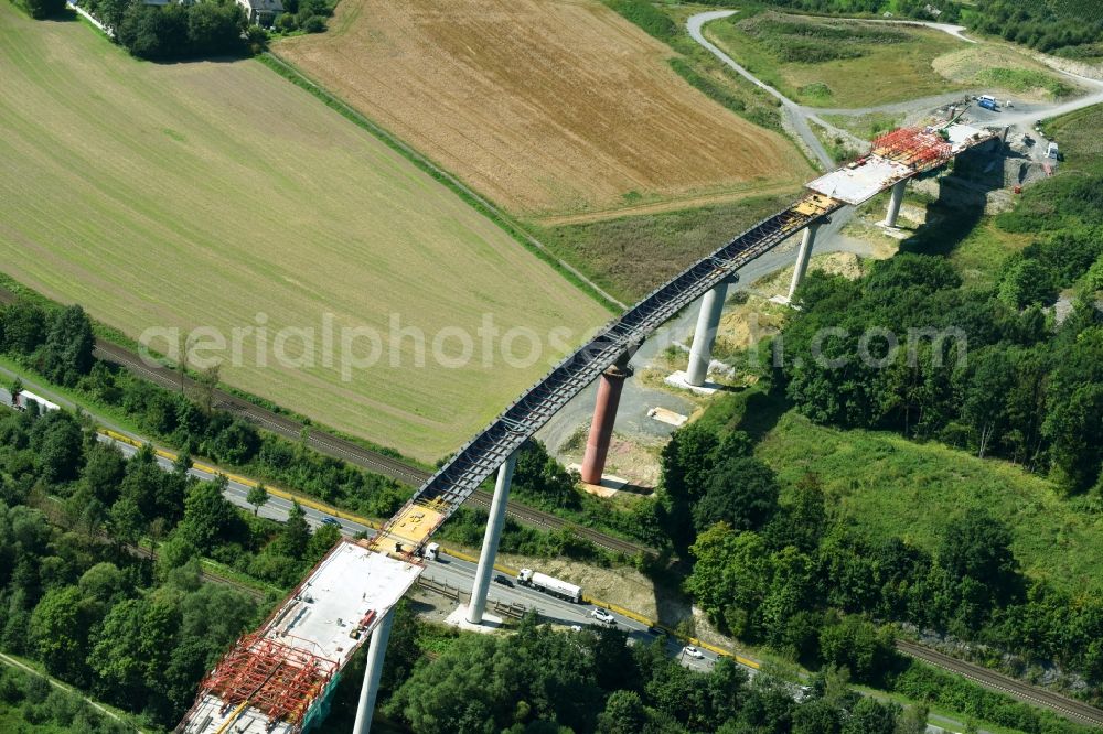 Olsberg from above - Construction site for the new building of Routing and traffic lanes over the highway bridge in the motorway A 46n in the district Bigge in Olsberg in the state North Rhine-Westphalia, Germany