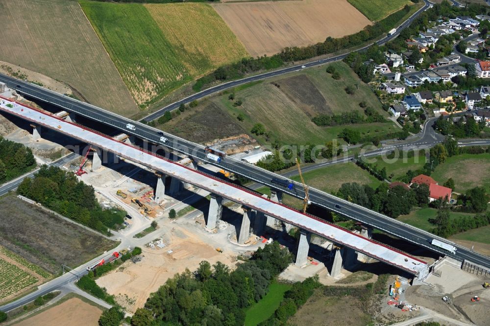 Kürnach from above - Construction site for the new building of Routing and traffic lanes over the highway bridge in the motorway A 7 of Talbruecke Kuernach in Kuernach in the state Bavaria, Germany