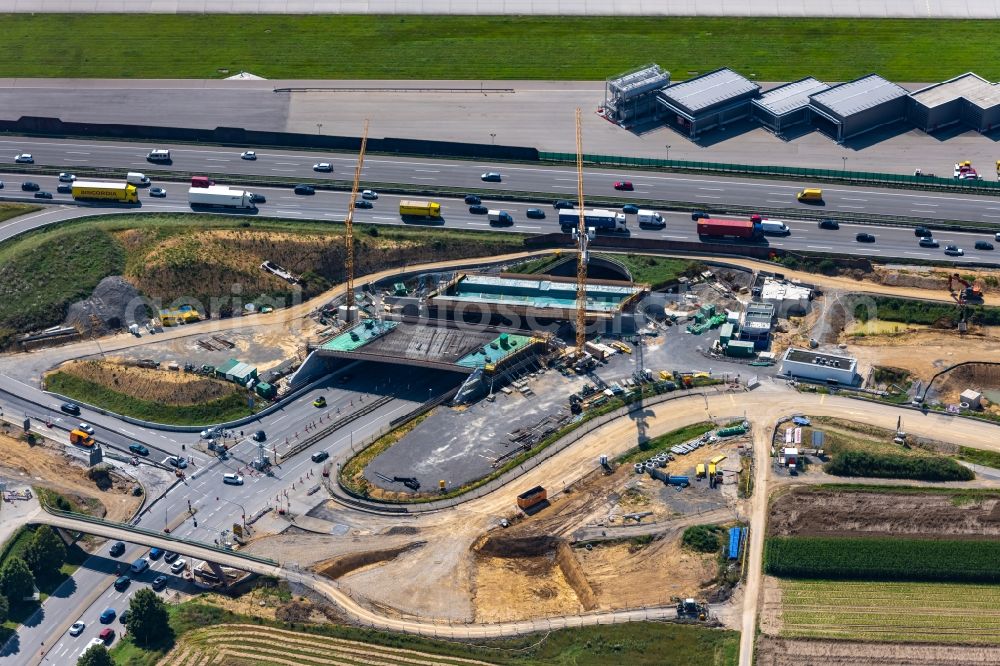 Stuttgart from the bird's eye view: Construction site of routing and traffic lanes during the highway exit and access the motorway A 8 in the district Plieningen in Stuttgart in the state Baden-Wuerttemberg, Germany