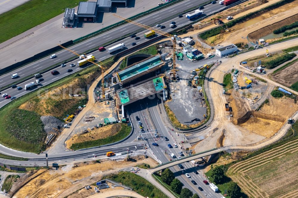 Stuttgart from the bird's eye view: Construction site of routing and traffic lanes during the highway exit and access the motorway A 8 in the district Plieningen in Stuttgart in the state Baden-Wuerttemberg, Germany