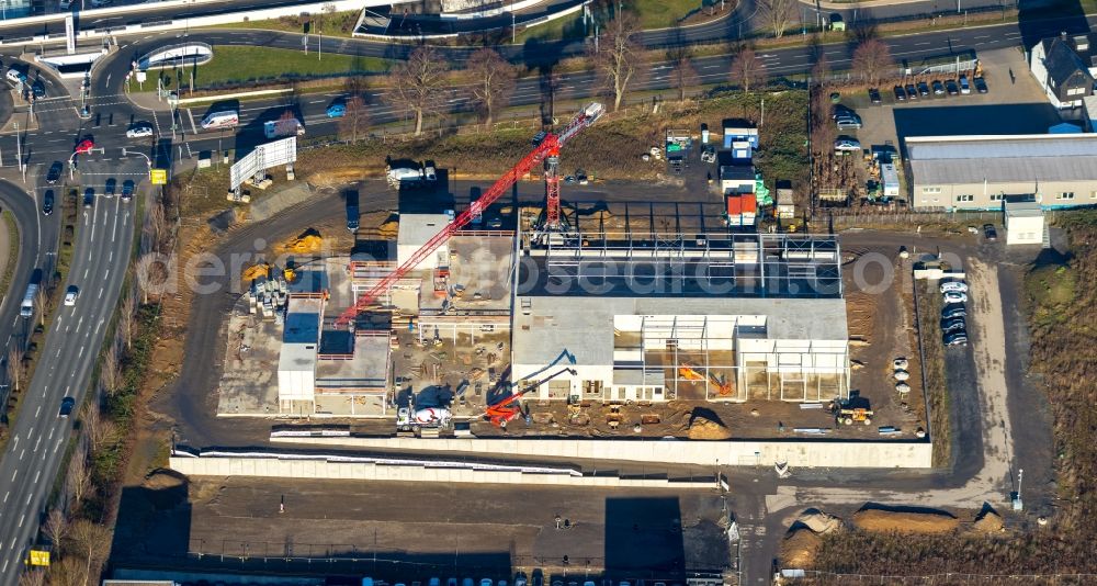 Holzwickede from above - Construction site at the car dealership of the car Porsche Zentrum Dortmund of Huelpert GmbH on Bertha-Krupp-Strasse in Holzwickede in the state North Rhine-Westphalia, Germany