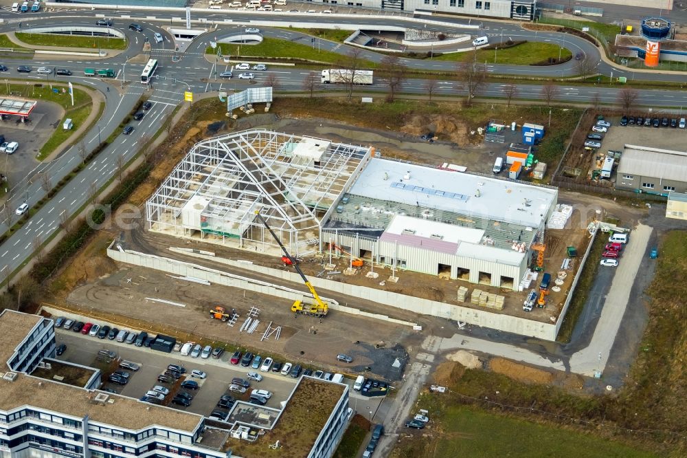 Holzwickede from the bird's eye view: Construction site at the car dealership of the car Porsche Zentrum Dortmund of Huelpert GmbH on Bertha-Krupp-Strasse in Holzwickede in the state North Rhine-Westphalia, Germany