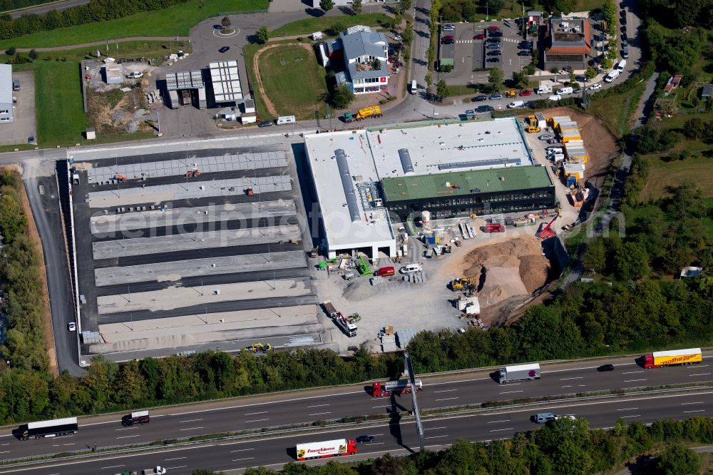 Aerial photograph Ellhofen - Construction site at the car dealership of the car of Schwarz Mobility Solutions GmbH Am Autobahnkreuz in Ellhofen in the state Baden-Wurttemberg, Germany