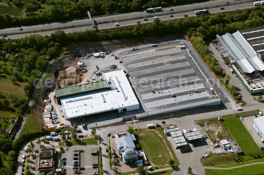 Ellhofen from the bird's eye view: Construction site at the car dealership of the car of Schwarz Mobility Solutions GmbH Am Autobahnkreuz in Ellhofen in the state Baden-Wurttemberg, Germany