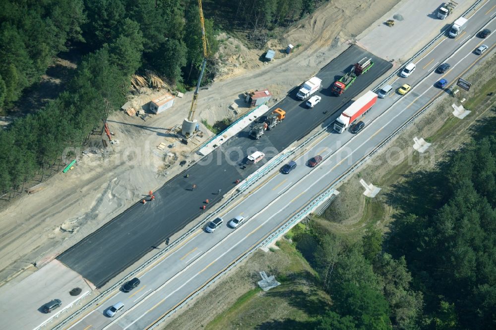 Heidesee from the bird's eye view: Highway construction site for the expansion and extension of track along the route of the motorway A12 E30 in Heidesee in the state Brandenburg