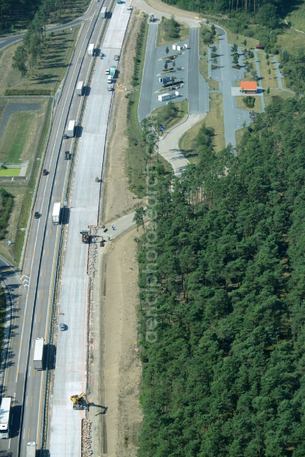 Spreenhagen from the bird's eye view: Highway construction site for the expansion and extension of track along the route of the motorway A12 E30 in Spreenhagen in the state Brandenburg