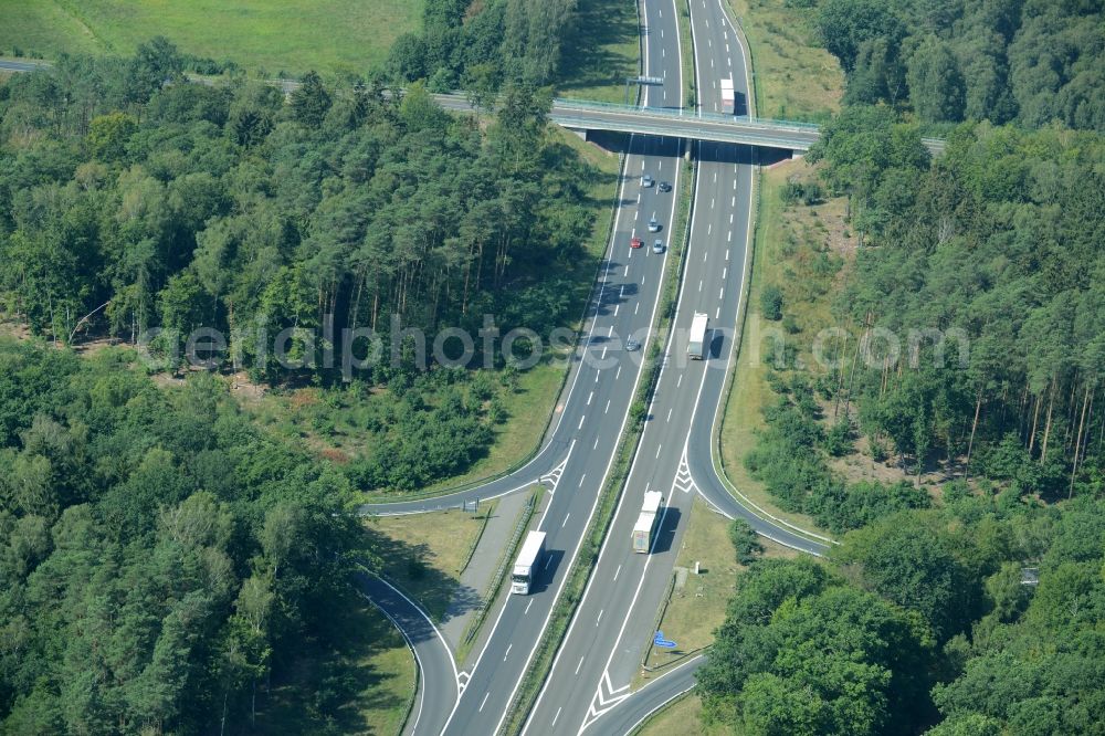 Spreenhagen from the bird's eye view: Highway construction site for the expansion and extension of track along the route of the motorway A12 E30 in Spreenhagen in the state Brandenburg