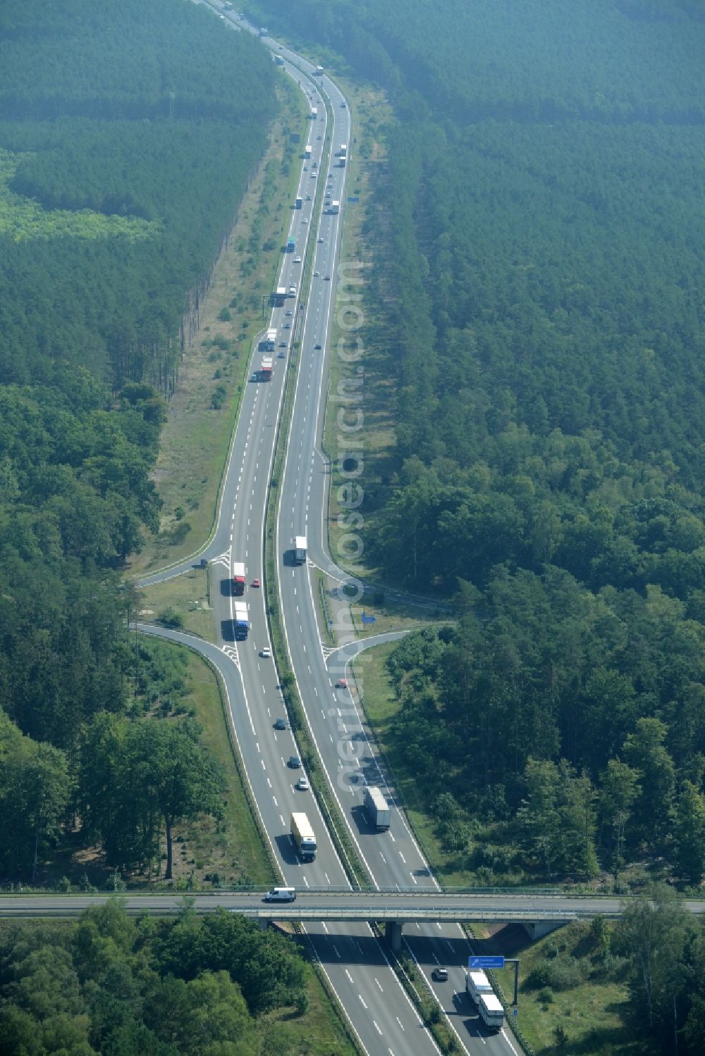 Spreenhagen from the bird's eye view: Highway construction site for the expansion and extension of track along the route of the motorway A12 E30 in Spreenhagen in the state Brandenburg