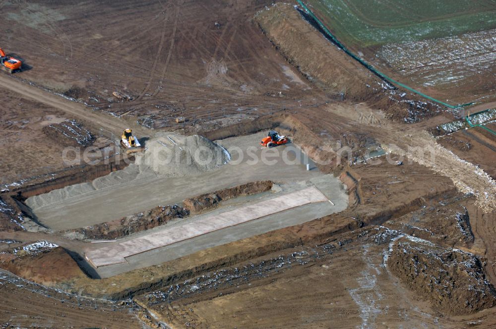 Aerial image Eisenach - Neubautrasse der BAB A 4 - Umfahrung Hörselberge in Thüringen bei Eisenach. Im September 2007 hat das Bieterkonsortium VINCI Concessions / Hochtief PPP (50/50) den Zuschlag für das A-Modell BAB A 4 Umfahrung Hörselberge (km 238,5 bis km 283,2) erhalten. Die bei diesem Projekt auf der Bauausführungsebene gegründete Arbeitsgemeinschaft wird von der EUROVIA Infra GmbH angeführt, des Weiteren sind hier die Unternehmen Hochtief, Strassing Limes und Rädlinger beteiligt. Durchgeführt werden die im Zuge dieses Projektes notwendigen Arbeiten unter an derem von den Mitarbeitern der Niederlassung Weimar der EUROVIA Verkehrsbau Union sowie der Niederlassungen Abbruch und Erdbau, Betonstraßenbau, Ingenieurbau und TECO Schallschutz der EUROVIA Beton.