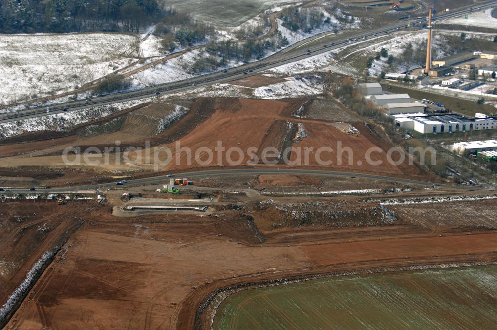 Eisenach from above - Neubautrasse der BAB A 4 - Umfahrung Hörselberge in Thüringen bei Eisenach. Im September 2007 hat das Bieterkonsortium VINCI Concessions / Hochtief PPP (50/50) den Zuschlag für das A-Modell BAB A 4 Umfahrung Hörselberge (km 238,5 bis km 283,2) erhalten. Die bei diesem Projekt auf der Bauausführungsebene gegründete Arbeitsgemeinschaft wird von der EUROVIA Infra GmbH angeführt, des Weiteren sind hier die Unternehmen Hochtief, Strassing Limes und Rädlinger beteiligt. Durchgeführt werden die im Zuge dieses Projektes notwendigen Arbeiten unter an derem von den Mitarbeitern der Niederlassung Weimar der EUROVIA Verkehrsbau Union sowie der Niederlassungen Abbruch und Erdbau, Betonstraßenbau, Ingenieurbau und TECO Schallschutz der EUROVIA Beton.