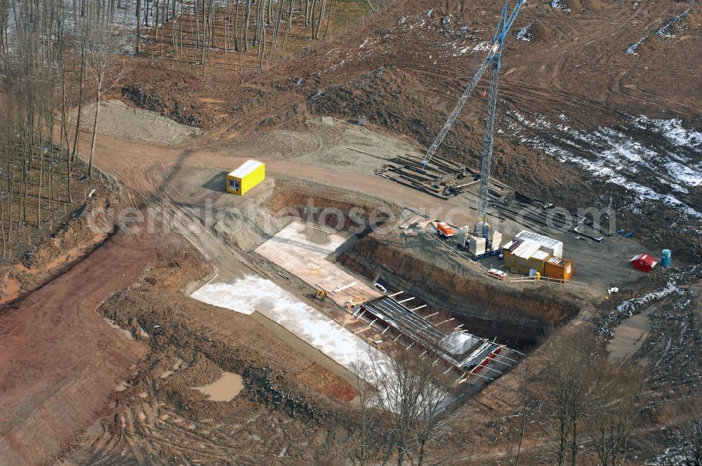 Eisenach from the bird's eye view: Neubautrasse der BAB A 4 - Umfahrung Hörselberge in Thüringen bei Eisenach. Im September 2007 hat das Bieterkonsortium VINCI Concessions / Hochtief PPP (50/50) den Zuschlag für das A-Modell BAB A 4 Umfahrung Hörselberge (km 238,5 bis km 283,2) erhalten. Die bei diesem Projekt auf der Bauausführungsebene gegründete Arbeitsgemeinschaft wird von der EUROVIA Infra GmbH angeführt, des Weiteren sind hier die Unternehmen Hochtief, Strassing Limes und Rädlinger beteiligt. Durchgeführt werden die im Zuge dieses Projektes notwendigen Arbeiten unter an derem von den Mitarbeitern der Niederlassung Weimar der EUROVIA Verkehrsbau Union sowie der Niederlassungen Abbruch und Erdbau, Betonstraßenbau, Ingenieurbau und TECO Schallschutz der EUROVIA Beton.