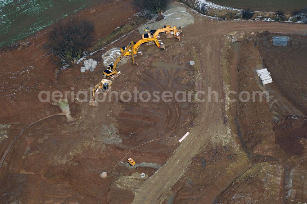 Eisenach from the bird's eye view: Neubautrasse der BAB A 4 - Umfahrung Hörselberge in Thüringen bei Eisenach. Im September 2007 hat das Bieterkonsortium VINCI Concessions / Hochtief PPP (50/50) den Zuschlag für das A-Modell BAB A 4 Umfahrung Hörselberge (km 238,5 bis km 283,2) erhalten. Die bei diesem Projekt auf der Bauausführungsebene gegründete Arbeitsgemeinschaft wird von der EUROVIA Infra GmbH angeführt, des Weiteren sind hier die Unternehmen Hochtief, Strassing Limes und Rädlinger beteiligt. Durchgeführt werden die im Zuge dieses Projektes notwendigen Arbeiten unter an derem von den Mitarbeitern der Niederlassung Weimar der EUROVIA Verkehrsbau Union sowie der Niederlassungen Abbruch und Erdbau, Betonstraßenbau, Ingenieurbau und TECO Schallschutz der EUROVIA Beton.