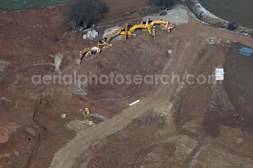 Aerial image Eisenach - Neubautrasse der BAB A 4 - Umfahrung Hörselberge in Thüringen bei Eisenach. Im September 2007 hat das Bieterkonsortium VINCI Concessions / Hochtief PPP (50/50) den Zuschlag für das A-Modell BAB A 4 Umfahrung Hörselberge (km 238,5 bis km 283,2) erhalten. Die bei diesem Projekt auf der Bauausführungsebene gegründete Arbeitsgemeinschaft wird von der EUROVIA Infra GmbH angeführt, des Weiteren sind hier die Unternehmen Hochtief, Strassing Limes und Rädlinger beteiligt. Durchgeführt werden die im Zuge dieses Projektes notwendigen Arbeiten unter an derem von den Mitarbeitern der Niederlassung Weimar der EUROVIA Verkehrsbau Union sowie der Niederlassungen Abbruch und Erdbau, Betonstraßenbau, Ingenieurbau und TECO Schallschutz der EUROVIA Beton.