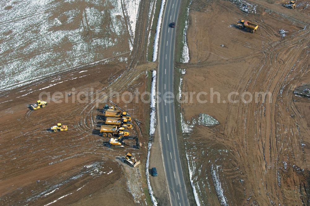 Aerial photograph Eisenach - Neubautrasse der BAB A 4 - Umfahrung Hörselberge in Thüringen bei Eisenach. Im September 2007 hat das Bieterkonsortium VINCI Concessions / Hochtief PPP (50/50) den Zuschlag für das A-Modell BAB A 4 Umfahrung Hörselberge (km 238,5 bis km 283,2) erhalten. Die bei diesem Projekt auf der Bauausführungsebene gegründete Arbeitsgemeinschaft wird von der EUROVIA Infra GmbH angeführt, des Weiteren sind hier die Unternehmen Hochtief, Strassing Limes und Rädlinger beteiligt. Durchgeführt werden die im Zuge dieses Projektes notwendigen Arbeiten unter an derem von den Mitarbeitern der Niederlassung Weimar der EUROVIA Verkehrsbau Union sowie der Niederlassungen Abbruch und Erdbau, Betonstraßenbau, Ingenieurbau und TECO Schallschutz der EUROVIA Beton.