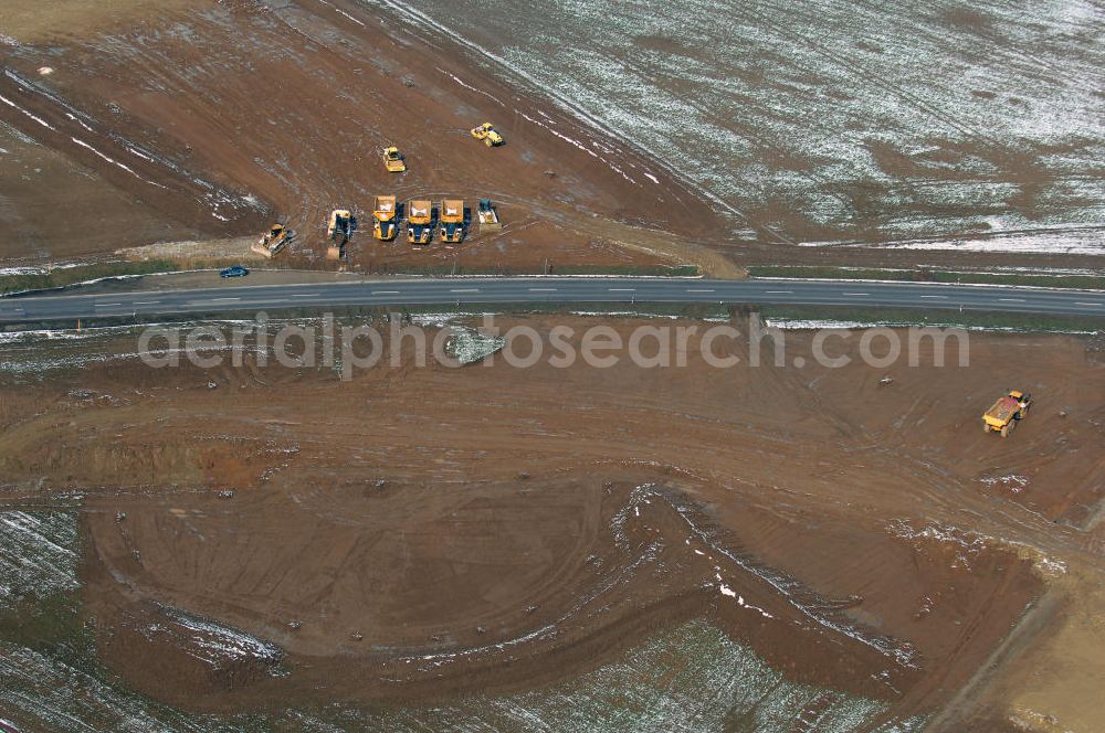 Eisenach from the bird's eye view: Neubautrasse der BAB A 4 - Umfahrung Hörselberge in Thüringen bei Eisenach. Im September 2007 hat das Bieterkonsortium VINCI Concessions / Hochtief PPP (50/50) den Zuschlag für das A-Modell BAB A 4 Umfahrung Hörselberge (km 238,5 bis km 283,2) erhalten. Die bei diesem Projekt auf der Bauausführungsebene gegründete Arbeitsgemeinschaft wird von der EUROVIA Infra GmbH angeführt, des Weiteren sind hier die Unternehmen Hochtief, Strassing Limes und Rädlinger beteiligt. Durchgeführt werden die im Zuge dieses Projektes notwendigen Arbeiten unter an derem von den Mitarbeitern der Niederlassung Weimar der EUROVIA Verkehrsbau Union sowie der Niederlassungen Abbruch und Erdbau, Betonstraßenbau, Ingenieurbau und TECO Schallschutz der EUROVIA Beton.