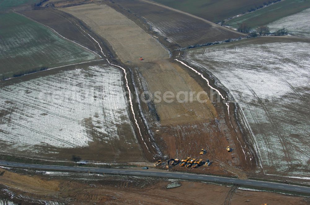 Aerial image Eisenach - Neubautrasse der BAB A 4 - Umfahrung Hörselberge in Thüringen bei Eisenach. Im September 2007 hat das Bieterkonsortium VINCI Concessions / Hochtief PPP (50/50) den Zuschlag für das A-Modell BAB A 4 Umfahrung Hörselberge (km 238,5 bis km 283,2) erhalten. Die bei diesem Projekt auf der Bauausführungsebene gegründete Arbeitsgemeinschaft wird von der EUROVIA Infra GmbH angeführt, des Weiteren sind hier die Unternehmen Hochtief, Strassing Limes und Rädlinger beteiligt. Durchgeführt werden die im Zuge dieses Projektes notwendigen Arbeiten unter an derem von den Mitarbeitern der Niederlassung Weimar der EUROVIA Verkehrsbau Union sowie der Niederlassungen Abbruch und Erdbau, Betonstraßenbau, Ingenieurbau und TECO Schallschutz der EUROVIA Beton.