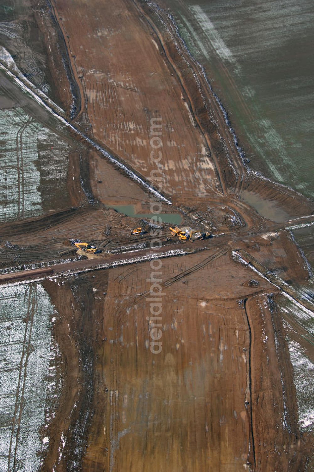 Aerial image Eisenach - Neubautrasse der BAB A 4 - Umfahrung Hörselberge in Thüringen bei Eisenach. Im September 2007 hat das Bieterkonsortium VINCI Concessions / Hochtief PPP (50/50) den Zuschlag für das A-Modell BAB A 4 Umfahrung Hörselberge (km 238,5 bis km 283,2) erhalten. Die bei diesem Projekt auf der Bauausführungsebene gegründete Arbeitsgemeinschaft wird von der EUROVIA Infra GmbH angeführt, des Weiteren sind hier die Unternehmen Hochtief, Strassing Limes und Rädlinger beteiligt. Durchgeführt werden die im Zuge dieses Projektes notwendigen Arbeiten unter an derem von den Mitarbeitern der Niederlassung Weimar der EUROVIA Verkehrsbau Union sowie der Niederlassungen Abbruch und Erdbau, Betonstraßenbau, Ingenieurbau und TECO Schallschutz der EUROVIA Beton.