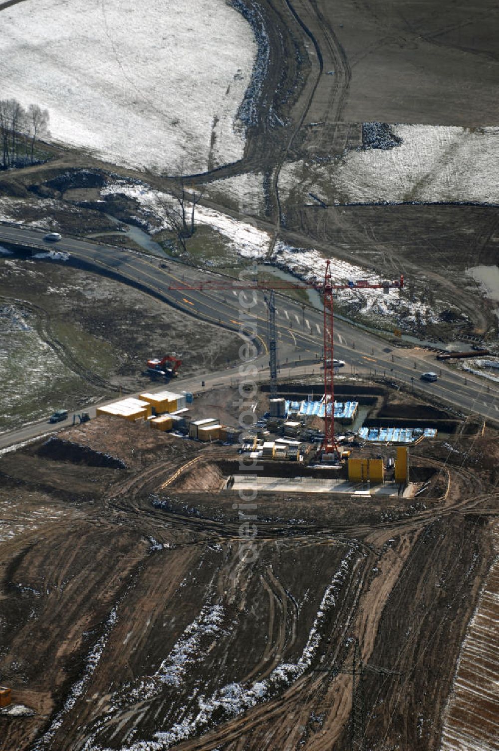 Aerial photograph Eisenach - Neubautrasse der BAB A 4 - Umfahrung Hörselberge in Thüringen bei Eisenach. Im September 2007 hat das Bieterkonsortium VINCI Concessions / Hochtief PPP (50/50) den Zuschlag für das A-Modell BAB A 4 Umfahrung Hörselberge (km 238,5 bis km 283,2) erhalten. Die bei diesem Projekt auf der Bauausführungsebene gegründete Arbeitsgemeinschaft wird von der EUROVIA Infra GmbH angeführt, des Weiteren sind hier die Unternehmen Hochtief, Strassing Limes und Rädlinger beteiligt. Durchgeführt werden die im Zuge dieses Projektes notwendigen Arbeiten unter an derem von den Mitarbeitern der Niederlassung Weimar der EUROVIA Verkehrsbau Union sowie der Niederlassungen Abbruch und Erdbau, Betonstraßenbau, Ingenieurbau und TECO Schallschutz der EUROVIA Beton.