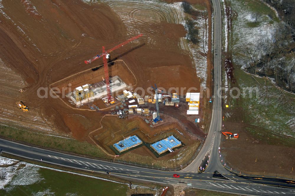 Aerial image Eisenach - Neubautrasse der BAB A 4 - Umfahrung Hörselberge in Thüringen bei Eisenach. Im September 2007 hat das Bieterkonsortium VINCI Concessions / Hochtief PPP (50/50) den Zuschlag für das A-Modell BAB A 4 Umfahrung Hörselberge (km 238,5 bis km 283,2) erhalten. Die bei diesem Projekt auf der Bauausführungsebene gegründete Arbeitsgemeinschaft wird von der EUROVIA Infra GmbH angeführt, des Weiteren sind hier die Unternehmen Hochtief, Strassing Limes und Rädlinger beteiligt. Durchgeführt werden die im Zuge dieses Projektes notwendigen Arbeiten unter an derem von den Mitarbeitern der Niederlassung Weimar der EUROVIA Verkehrsbau Union sowie der Niederlassungen Abbruch und Erdbau, Betonstraßenbau, Ingenieurbau und TECO Schallschutz der EUROVIA Beton.