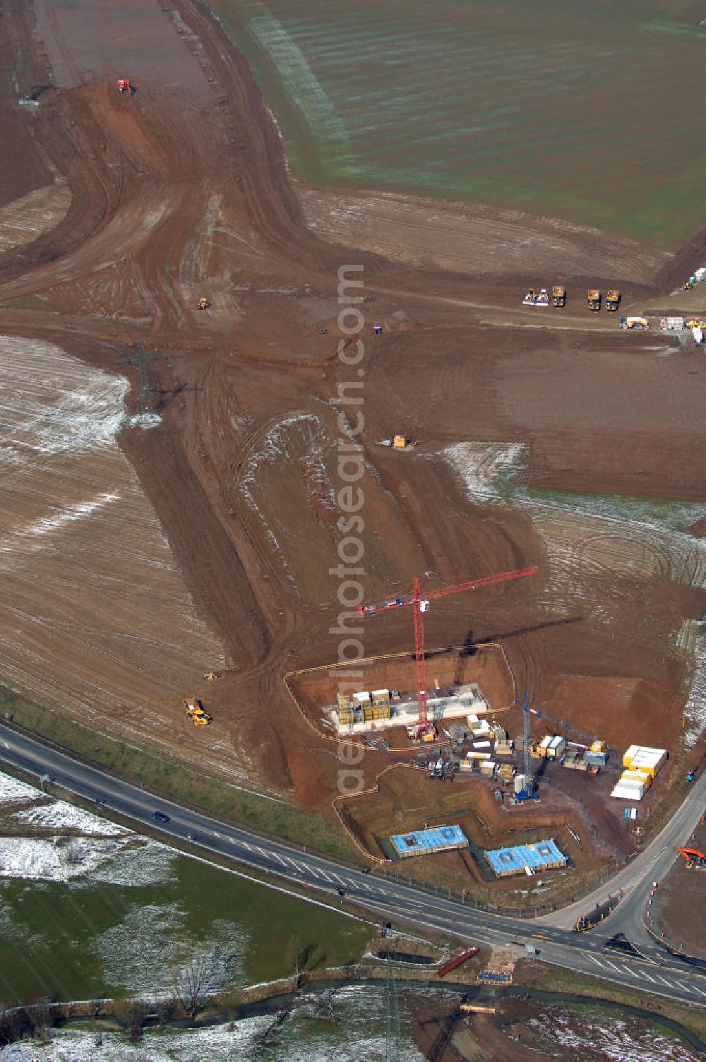 Aerial photograph Eisenach - Neubautrasse der BAB A 4 - Umfahrung Hörselberge in Thüringen bei Eisenach. Im September 2007 hat das Bieterkonsortium VINCI Concessions / Hochtief PPP (50/50) den Zuschlag für das A-Modell BAB A 4 Umfahrung Hörselberge (km 238,5 bis km 283,2) erhalten. Die bei diesem Projekt auf der Bauausführungsebene gegründete Arbeitsgemeinschaft wird von der EUROVIA Infra GmbH angeführt, des Weiteren sind hier die Unternehmen Hochtief, Strassing Limes und Rädlinger beteiligt. Durchgeführt werden die im Zuge dieses Projektes notwendigen Arbeiten unter an derem von den Mitarbeitern der Niederlassung Weimar der EUROVIA Verkehrsbau Union sowie der Niederlassungen Abbruch und Erdbau, Betonstraßenbau, Ingenieurbau und TECO Schallschutz der EUROVIA Beton.