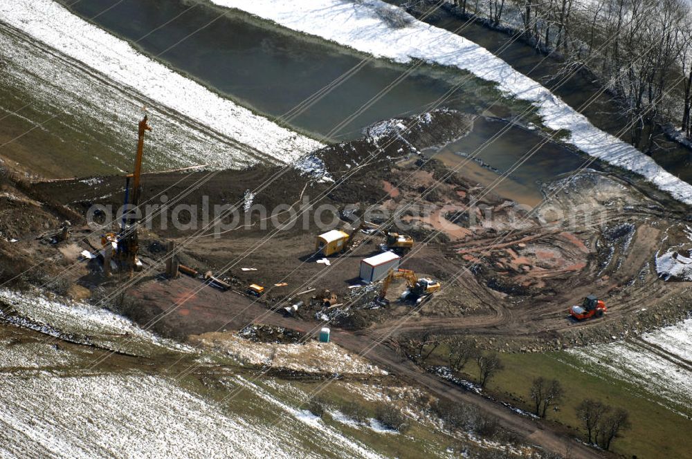 Aerial image Eisenach - Neubautrasse der BAB A 4 - Umfahrung Hörselberge in Thüringen bei Eisenach. Im September 2007 hat das Bieterkonsortium VINCI Concessions / Hochtief PPP (50/50) den Zuschlag für das A-Modell BAB A 4 Umfahrung Hörselberge (km 238,5 bis km 283,2) erhalten. Die bei diesem Projekt auf der Bauausführungsebene gegründete Arbeitsgemeinschaft wird von der EUROVIA Infra GmbH angeführt, des Weiteren sind hier die Unternehmen Hochtief, Strassing Limes und Rädlinger beteiligt. Durchgeführt werden die im Zuge dieses Projektes notwendigen Arbeiten unter an derem von den Mitarbeitern der Niederlassung Weimar der EUROVIA Verkehrsbau Union sowie der Niederlassungen Abbruch und Erdbau, Betonstraßenbau, Ingenieurbau und TECO Schallschutz der EUROVIA Beton.