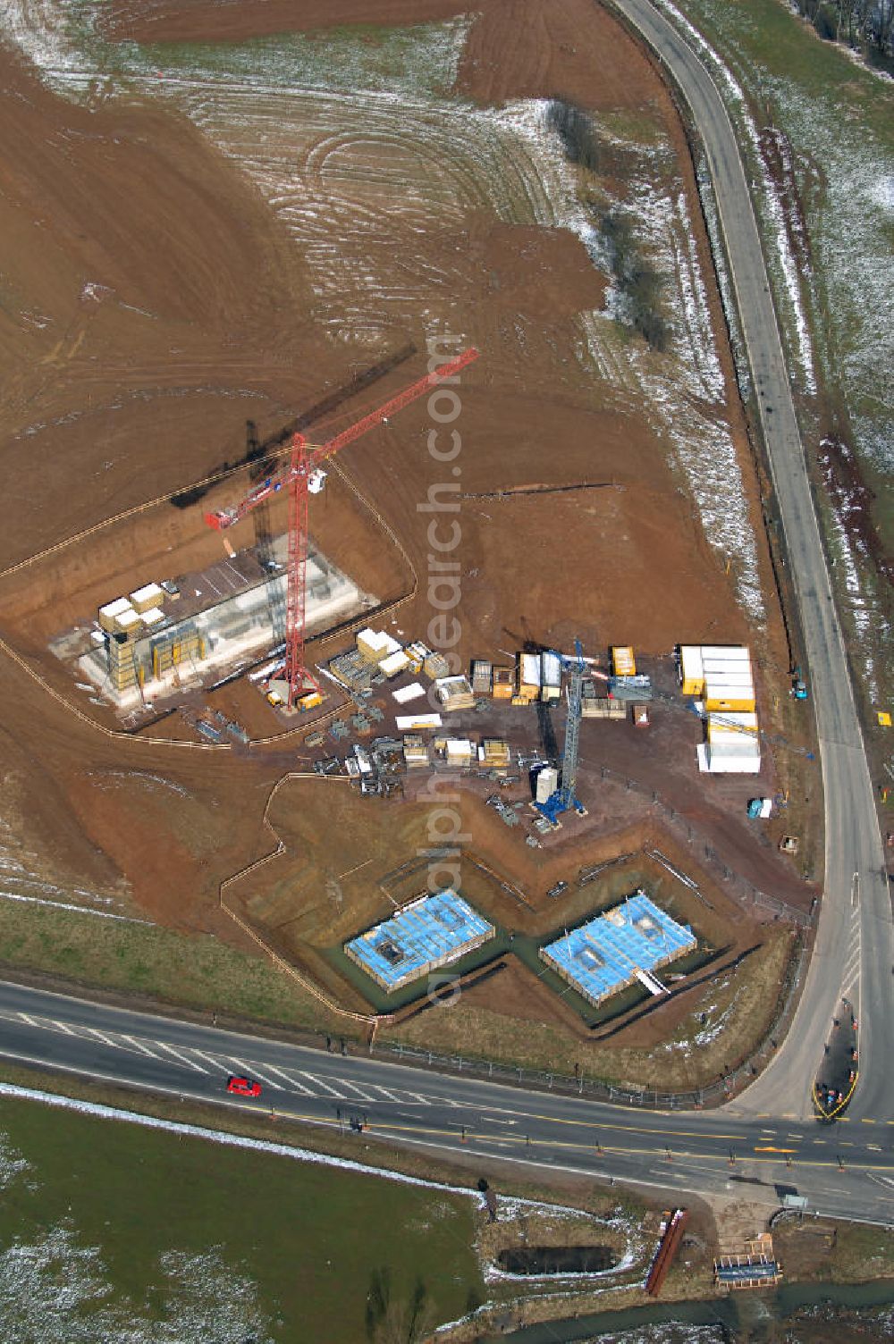 Aerial photograph Eisenach - Neubautrasse der BAB A 4 - Umfahrung Hörselberge in Thüringen bei Eisenach. Im September 2007 hat das Bieterkonsortium VINCI Concessions / Hochtief PPP (50/50) den Zuschlag für das A-Modell BAB A 4 Umfahrung Hörselberge (km 238,5 bis km 283,2) erhalten. Die bei diesem Projekt auf der Bauausführungsebene gegründete Arbeitsgemeinschaft wird von der EUROVIA Infra GmbH angeführt, des Weiteren sind hier die Unternehmen Hochtief, Strassing Limes und Rädlinger beteiligt. Durchgeführt werden die im Zuge dieses Projektes notwendigen Arbeiten unter an derem von den Mitarbeitern der Niederlassung Weimar der EUROVIA Verkehrsbau Union sowie der Niederlassungen Abbruch und Erdbau, Betonstraßenbau, Ingenieurbau und TECO Schallschutz der EUROVIA Beton.