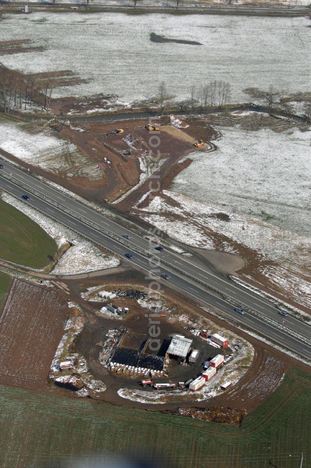 Eisenach from the bird's eye view: Neubautrasse der BAB A 4 - Umfahrung Hörselberge in Thüringen bei Eisenach. Im September 2007 hat das Bieterkonsortium VINCI Concessions / Hochtief PPP (50/50) den Zuschlag für das A-Modell BAB A 4 Umfahrung Hörselberge (km 238,5 bis km 283,2) erhalten. Die bei diesem Projekt auf der Bauausführungsebene gegründete Arbeitsgemeinschaft wird von der EUROVIA Infra GmbH angeführt, des Weiteren sind hier die Unternehmen Hochtief, Strassing Limes und Rädlinger beteiligt. Durchgeführt werden die im Zuge dieses Projektes notwendigen Arbeiten unter an derem von den Mitarbeitern der Niederlassung Weimar der EUROVIA Verkehrsbau Union sowie der Niederlassungen Abbruch und Erdbau, Betonstraßenbau, Ingenieurbau und TECO Schallschutz der EUROVIA Beton.