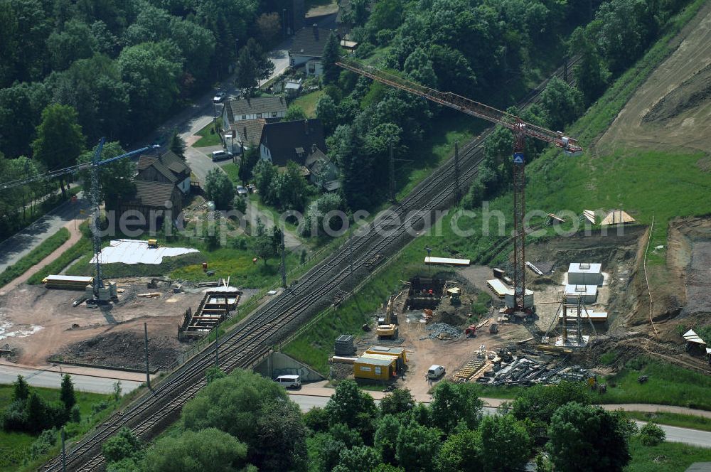 Aerial photograph Eisenach - Kindel - Neubautrasse der BAB A 4 - Umfahrung Hörselberge in Thüringen bei Eisenach. Im September 2007 hat das Bieterkonsortium VINCI Concessions / Hochtief PPP (50/50) den Zuschlag für das A-Modell BAB A 4 Umfahrung Hörselberge (km 238,5 bis km 283,2) erhalten. Die bei diesem Projekt auf der Bauausführungsebene gegründete Arbeitsgemeinschaft wird von der EUROVIA Infra GmbH angeführt, des Weiteren sind hier die Unternehmen Hochtief, Strassing Limes und Rädlinger beteiligt. Durchgeführt werden die im Zuge dieses Projektes notwendigen Arbeiten unter an derem von den Mitarbeitern der Niederlassung Weimar der EUROVIA Verkehrsbau Union sowie der Niederlassungen Abbruch und Erdbau, Betonstraßenbau, Ingenieurbau und TECO Schallschutz der EUROVIA Beton. DEGES