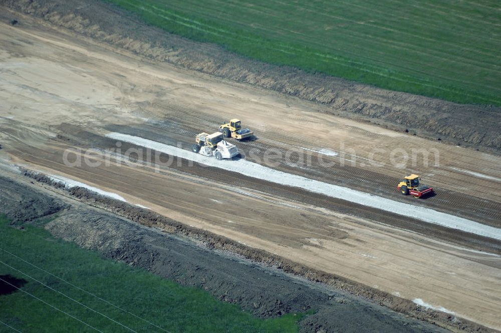 Eisenach - Kindel from the bird's eye view: Neubautrasse der BAB A 4 - Umfahrung Hörselberge in Thüringen bei Eisenach. Im September 2007 hat das Bieterkonsortium VINCI Concessions / Hochtief PPP (50/50) den Zuschlag für das A-Modell BAB A 4 Umfahrung Hörselberge (km 238,5 bis km 283,2) erhalten. Die bei diesem Projekt auf der Bauausführungsebene gegründete Arbeitsgemeinschaft wird von der EUROVIA Infra GmbH angeführt, des Weiteren sind hier die Unternehmen Hochtief, Strassing Limes und Rädlinger beteiligt. Durchgeführt werden die im Zuge dieses Projektes notwendigen Arbeiten unter an derem von den Mitarbeitern der Niederlassung Weimar der EUROVIA Verkehrsbau Union sowie der Niederlassungen Abbruch und Erdbau, Betonstraßenbau, Ingenieurbau und TECO Schallschutz der EUROVIA Beton. DEGES