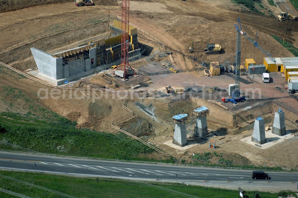 Eisenach - Kindel from the bird's eye view: Neubautrasse der BAB A 4 - Umfahrung Hörselberge in Thüringen bei Eisenach. Im September 2007 hat das Bieterkonsortium VINCI Concessions / Hochtief PPP (50/50) den Zuschlag für das A-Modell BAB A 4 Umfahrung Hörselberge (km 238,5 bis km 283,2) erhalten. Die bei diesem Projekt auf der Bauausführungsebene gegründete Arbeitsgemeinschaft wird von der EUROVIA Infra GmbH angeführt, des Weiteren sind hier die Unternehmen Hochtief, Strassing Limes und Rädlinger beteiligt. Durchgeführt werden die im Zuge dieses Projektes notwendigen Arbeiten unter an derem von den Mitarbeitern der Niederlassung Weimar der EUROVIA Verkehrsbau Union sowie der Niederlassungen Abbruch und Erdbau, Betonstraßenbau, Ingenieurbau und TECO Schallschutz der EUROVIA Beton. DEGES