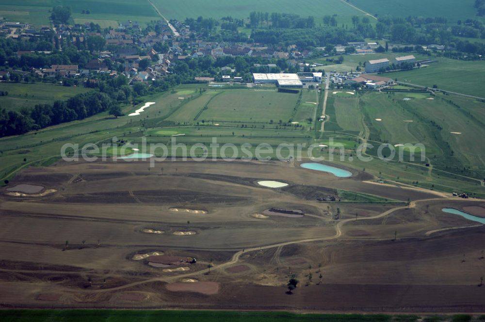 Aerial photograph Eisenach - Neubautrasse der BAB A 4 - Umfahrung Hörselberge in Thüringen bei Eisenach. Im September 2007 hat das Bieterkonsortium VINCI Concessions / Hochtief PPP (50/50) den Zuschlag für das A-Modell BAB A 4 Umfahrung Hörselberge (km 238,5 bis km 283,2) erhalten. Die bei diesem Projekt auf der Bauausführungsebene gegründete Arbeitsgemeinschaft wird von der EUROVIA Infra GmbH angeführt, des Weiteren sind hier die Unternehmen Hochtief, Strassing Limes und Rädlinger beteiligt. Durchgeführt werden die im Zuge dieses Projektes notwendigen Arbeiten unter an derem von den Mitarbeitern der Niederlassung Weimar der EUROVIA Verkehrsbau Union sowie der Niederlassungen Abbruch und Erdbau, Betonstraßenbau, Ingenieurbau und TECO Schallschutz der EUROVIA Beton.