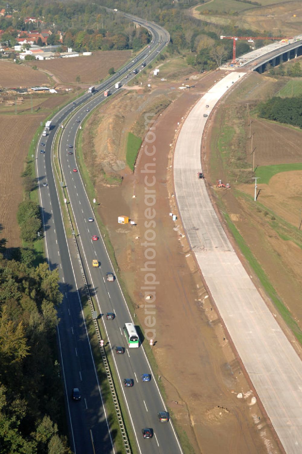 Aerial image Sättelstädt - Blick auf die Baustelle des Übergang der alten A4 auf die neue A4 bei Sättelstädt. Der Neubau ist Teil des Projekt Nordverlegung / Umfahrung Hörselberge der Autobahn E40 / A4 in Thüringen bei Eisenach. Durchgeführt werden die im Zuge dieses Projektes notwendigen Arbeiten unter an derem von den Mitarbeitern der Niederlassung Weimar der EUROVIA Verkehrsbau Union sowie der Niederlassungen Abbruch und Erdbau, Betonstraßenbau, Ingenieurbau und TECO Schallschutz der EUROVIA Beton sowie der DEGES.