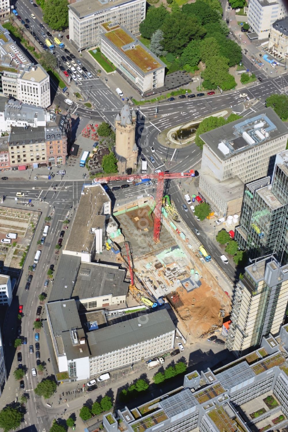 Frankfurt am Main from the bird's eye view: Construction site at Bleichstraße 57 at the location of the former cinema Turmpalast in the inner city district of Frankfurt in the state of Hessen. The cinema operated for 83 years until 2010. The historical Eschenheimer tower is close-by