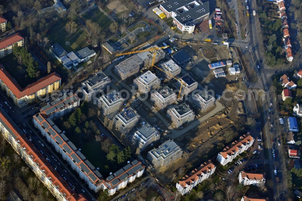 Aerial image Berlin - View of the building lot of a residential quarter of Cedelia construction project in Berlin-Zehlendorf at Dahlemer Weg and the Robert-W-Kempner-Strasse. The project is a joint venture of the project partners HKP Dahlemer Weg Verwaltungs GmbH, HOCHTIEF-HTP Projektentwicklung and KONDOR WESSELS