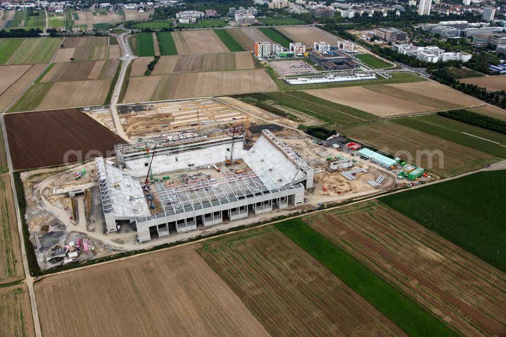 Aerial photograph Mainz - Die Baustelle der Coface-Arena, die als neues Stadion für den Fußballverein FSV Mainz 05 dienen soll. Die Bauarbeiten wurden 2009 begonnen und sollen bis 2011 abgeschlossen sein. Bauherr und Eigentümerin des Neubauprojektes ist die stadteigene Grundstücksverwaltungsgesellschaft der Stadt Mainz mbH (GVG). View to the building area of the new football stadium Coface-Arena in Mainz.