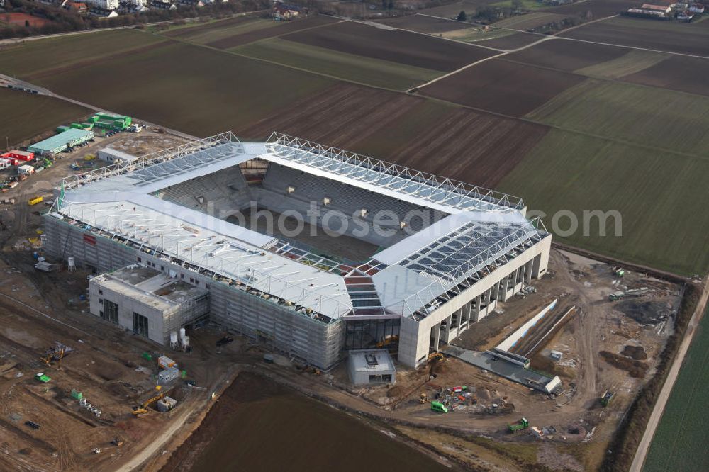 Aerial photograph Mainz - Die Baustelle der Coface-Arena, die als neues Stadion für den Fußballverein FSV Mainz 05 dienen soll. Die Bauarbeiten wurden 2009 begonnen und sollen bis 2011 abgeschlossen sein. Bauherr und Eigentümerin des Neubauprojektes ist die stadteigene Grundstücksverwaltungsgesellschaft der Stadt Mainz mbH (GVG). View to the building area of the new football stadium Coface-Arena in Mainz.