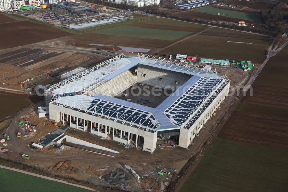 Mainz from above - Die Baustelle der Coface-Arena, die als neues Stadion für den Fußballverein FSV Mainz 05 dienen soll. Die Bauarbeiten wurden 2009 begonnen und sollen bis 2011 abgeschlossen sein. Bauherr und Eigentümerin des Neubauprojektes ist die stadteigene Grundstücksverwaltungsgesellschaft der Stadt Mainz mbH (GVG). View to the building area of the new football stadium Coface-Arena in Mainz.