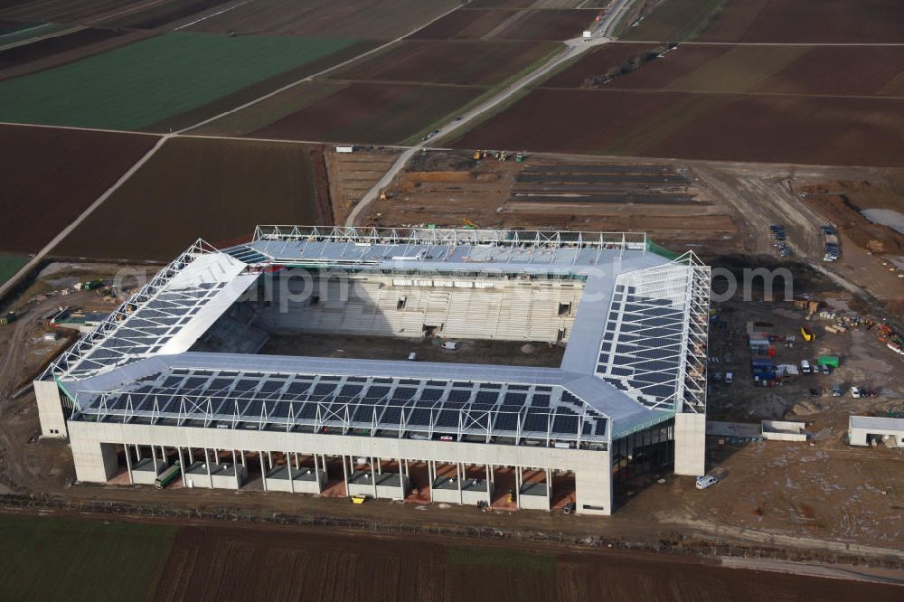 Mainz from the bird's eye view: Die Baustelle der Coface-Arena, die als neues Stadion für den Fußballverein FSV Mainz 05 dienen soll. Die Bauarbeiten wurden 2009 begonnen und sollen bis 2011 abgeschlossen sein. Bauherr und Eigentümerin des Neubauprojektes ist die stadteigene Grundstücksverwaltungsgesellschaft der Stadt Mainz mbH (GVG). View to the building area of the new football stadium Coface-Arena in Mainz.