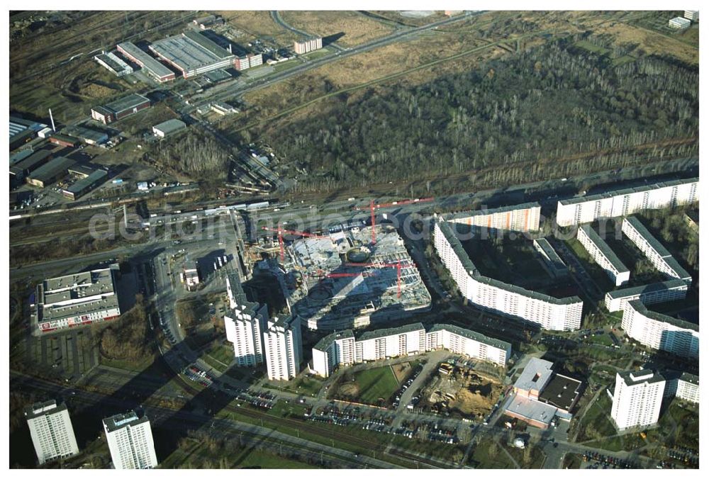 Aerial photograph Berlin - Marzahn - Seit dem 28. November 2003 laufen die Bauarbeiten für das 150 Millionen Euro teure Eastgate - eines der größten und außergewöhnlichsten Einkaufs- und Erlebniszentren Berlins und Ostdeutschlands. Ausführungsplanung: npp Noack Planung und Projektentwicklung GmbH, Anton-Graff-Straße 24, 01309 Dresden Generalunternehmer: Wayss & Freytag Schlüsselfertigbau AG, Hauptniederlassung Nord/Ost, Niederlassung Göttingen, Maschmühlenweg 105, 37081 Göttingen