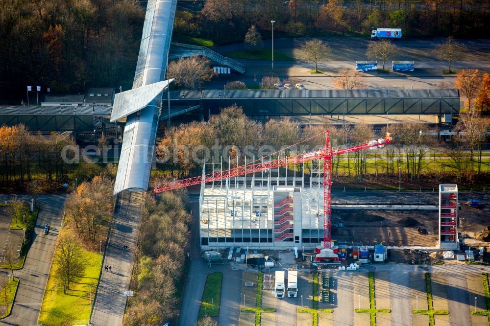 Gelsenkirchen from above - Football stadium Veltins Arena Auf Schalke of the football club Schalke 04 in Gelsenkirchen in the state of North Rhine-Westphalia. A new park house is being built behind the stadium