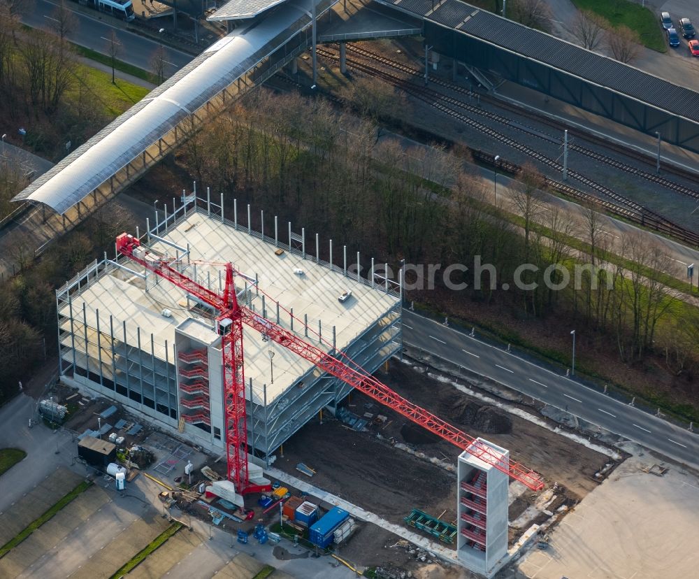 Aerial photograph Gelsenkirchen - Construction site of a new parking facility at the Football stadium Veltins Arena Auf Schalke of the football club Schalke 04 in Gelsenkirchen in the state of North Rhine-Westphalia. A new park house is being built behind the stadium