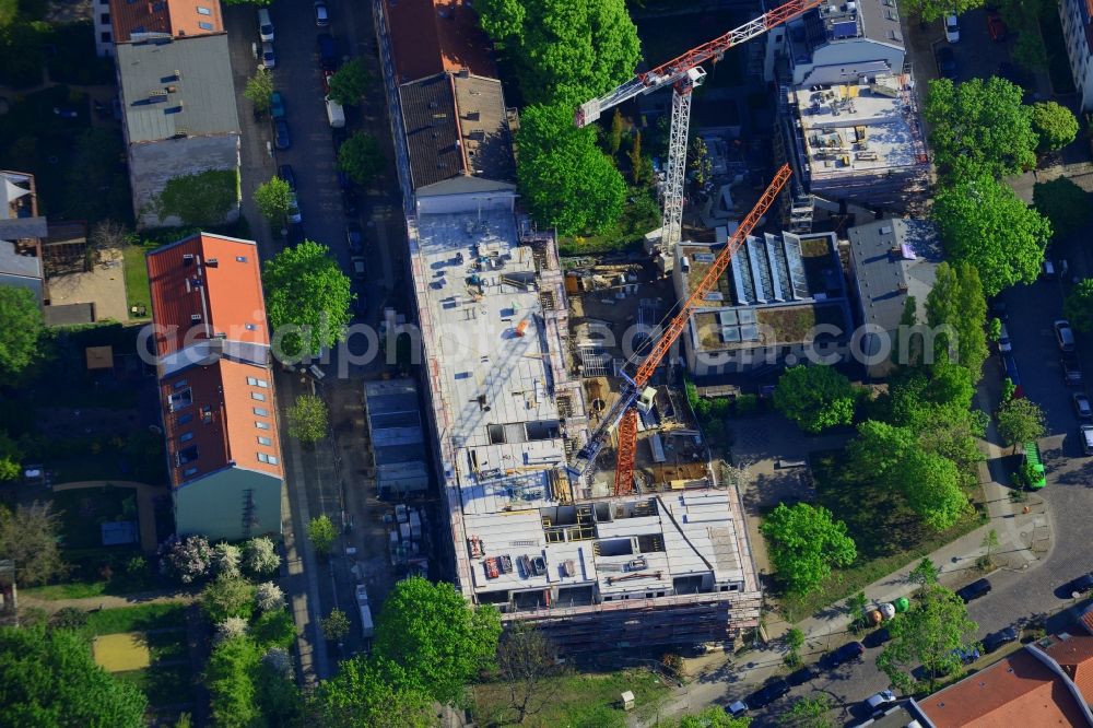 Aerial image Berlin - Construction site of a residential building in the Rummelsburg part of the district of Lichtenberg in Berlin in Germany. The construction site is located on Kernhofer Strasse, on the corner of Tuerrschmidtstrasse. A multi-family house with commercial units is planned as well as a hotel