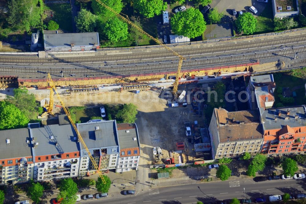 Aerial photograph Berlin - Construction site in the Rummelsburg part of the district of Lichtenberg in Berlin in Germany. The construction site is located on Noeldnerstrasse on railway tracks