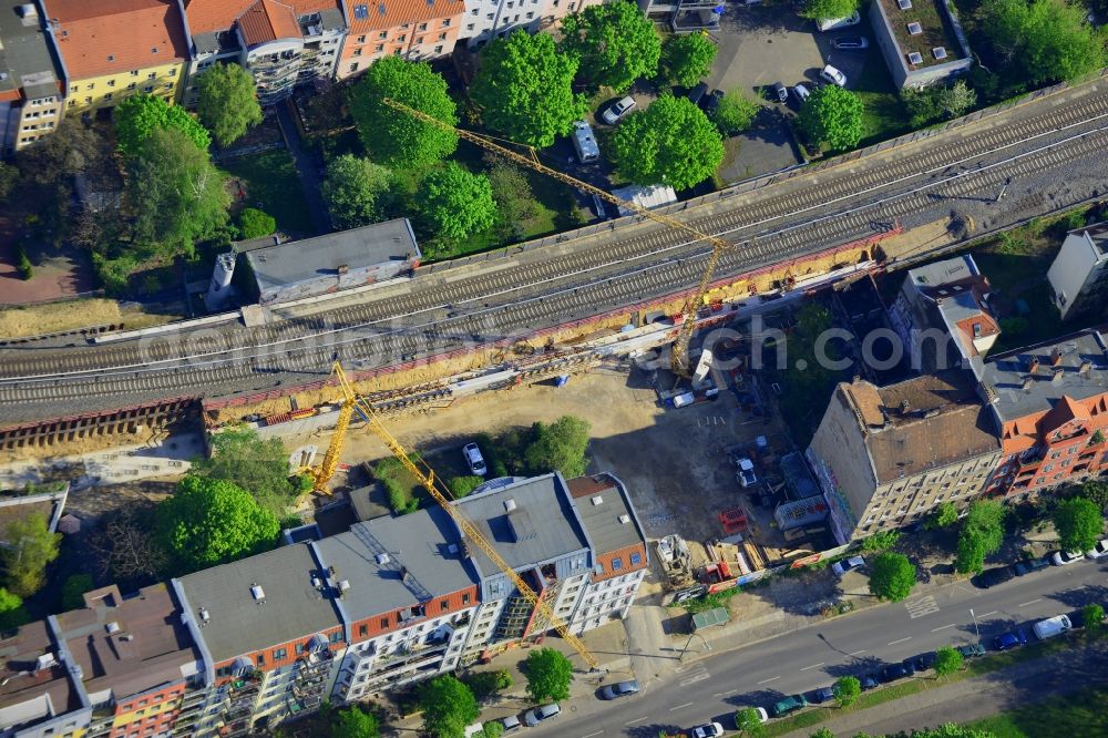 Berlin from the bird's eye view: Construction site in the Rummelsburg part of the district of Lichtenberg in Berlin in Germany. The construction site is located on Noeldnerstrasse on railway tracks