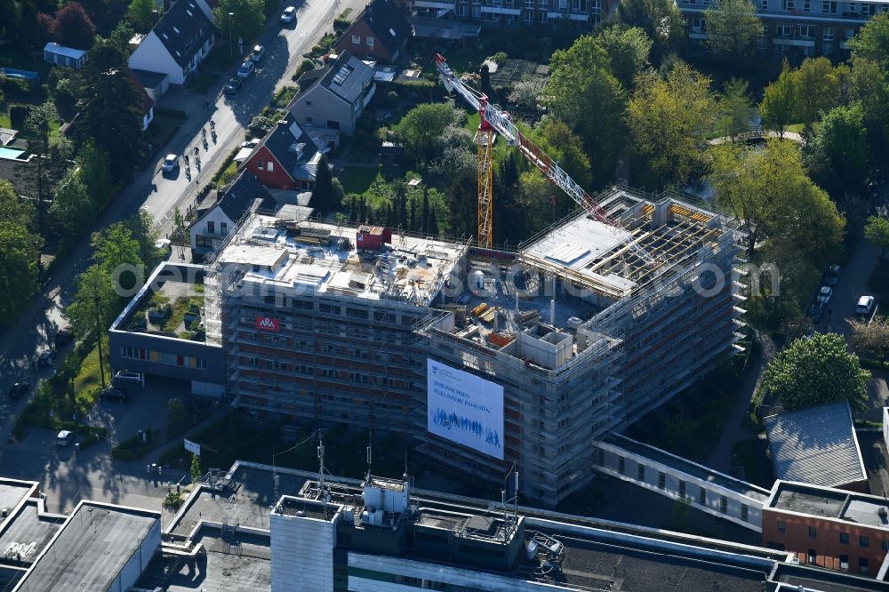 Aerial photograph Rotenburg (Wümme) - Construction site for a new extension to the hospital grounds AGAPLESION DIAKONIEKLINIKUM ROTENBURG on Lindenstrasse in Rotenburg (Wuemme) in the state Lower Saxony, Germany