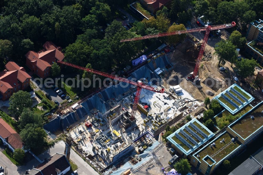 Aerial image Berlin - Construction site for a new extension to the hospital grounds Arona Klinik of UKB BG Klinikum Unfallkrankenhaus Berlin gGmbH in the district Bezirk Marzahn-Hellersdorf in Berlin